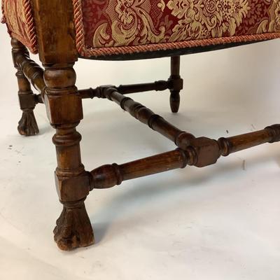 Sale Photo Thumbnail #222: Red & Gold Damask Upholstered seat (with damage) Chair itself is in good structural condition. carved walnut arms and claw feet with stretcher. measuring 46" high x 25" wide x 31" deep 18" seat height x 19" seat depth.