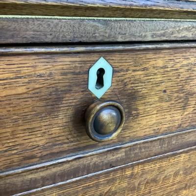 Sale Photo Thumbnail #298: With Ivory Esutcheons on the desk drawer pulls,and key holes. This piece would make a wonderful addition to any collector. The leather top on the desk has been completely restored with kelly green gold border leather. Comes in two pieces and Ogee feet. Ch