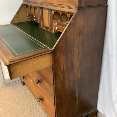 Sale Photo Thumbnail #293: With Ivory Esutcheons on the desk drawer pulls,and key holes. This piece would make a wonderful addition to any collector. The leather top on the desk has been completely restored with kelly green gold border leather. Comes in two pieces and Ogee feet. Ch
