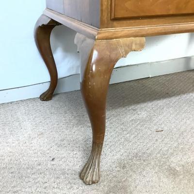 Sale Photo Thumbnail #303: This highboy is 2 piece's, made of a mix of cherry and pine; cabriole legs with fluted snake feet; on the very top center drawer it has inlay with the initials "I & B"; total of 11 drawers that are dovetail jointed, with a mixture of different brass pulls