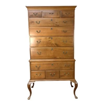 Sale Photo Thumbnail #300: This highboy is 2 piece's, made of a mix of cherry and pine; cabriole legs with fluted snake feet; on the very top center drawer it has inlay with the initials "I & B"; total of 11 drawers that are dovetail jointed, with a mixture of different brass pulls