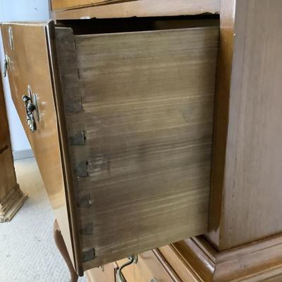 Sale Photo Thumbnail #304: This highboy is 2 piece's, made of a mix of cherry and pine; cabriole legs with fluted snake feet; on the very top center drawer it has inlay with the initials "I & B"; total of 11 drawers that are dovetail jointed, with a mixture of different brass pulls