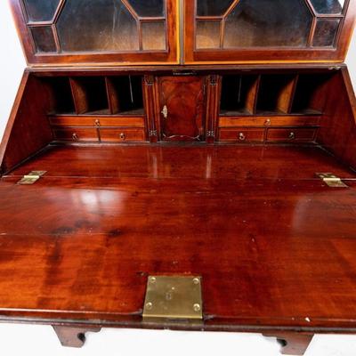 Sale Photo Thumbnail #320: George III Style English Bureau-Bookcase in Mahogany of Rich Color and Patina with Overall Satinwood Banding. The slant front displays beautifully flamed mahogany and opens to reveal a fitted interior with two document drawers and six pigeon holes over si