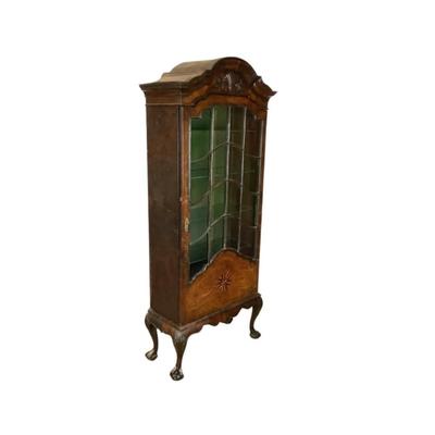 Sale Photo Thumbnail #328: 18th or early 19th century Continental vitrine, applied shell frieze at the top, arched mullions over glass, with compass inlay on the veneered bottom half, scalloped base, claw on ball feet. It has a built in light switch that plugs into the wall and it 