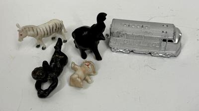 Sale Photo Thumbnail #398: Includes a zebra, elephant, chrome train engine, cat and