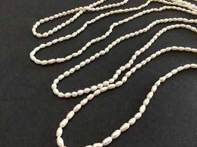 4 Necklaces Fresh Water Seed Pearls.