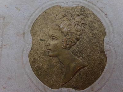 VERY OLD Keepsake box with a gold tone cameo on the lid