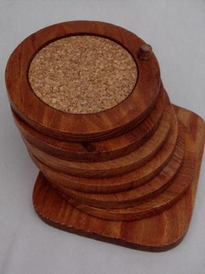 Set of 6 wood w/cork coaster on a peg style holder.