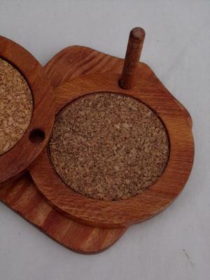 Set of 6 wood w/cork coaster on a peg style holder.