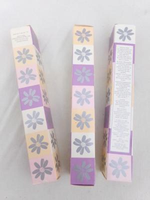 Three packages of “Bath Fizz Balls”, assorted scents.