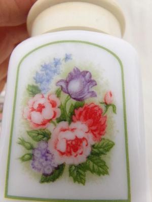 pair Avon “Country Garden” powder sachets. Milk glass w/lift off caps, about 3-1/4" tall.