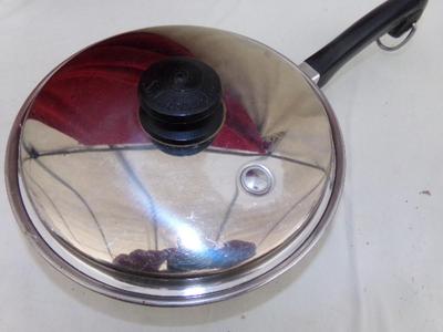 Salad Master stainless steel 8" pan w/matching lid & stay cool handle.