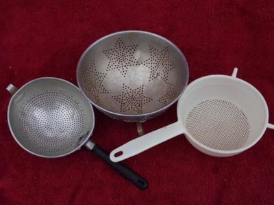 THREE colanders, assorted size & style. Good.