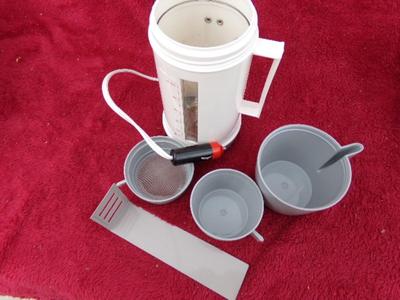 AUTO COFFEE MAKER & soup warmer. Plugs in to the cigar lighter