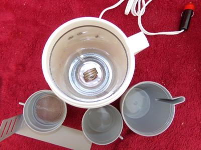 AUTO COFFEE MAKER & soup warmer. Plugs in to the cigar lighter