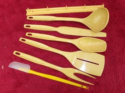 Kitchen utensil set w/wall hanger piece, looks like new in box.