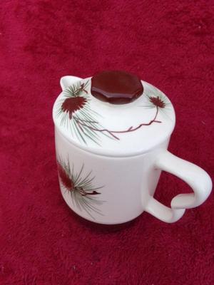 Classic ceramic pitcher w/lid, hand painted & glazed. About 8" tall.