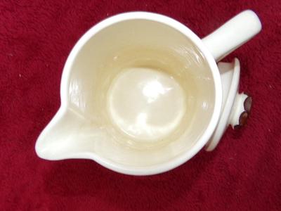 Classic ceramic pitcher w/lid, hand painted & glazed. About 8" tall.