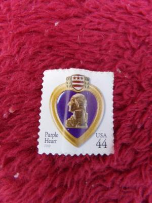 OK collectors. Unused peel & stick Purple Heart U.S. Postage stamp