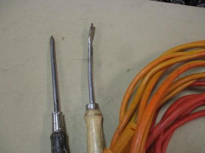 Sale Photo Thumbnail #1507: Assortment Of Hand Tools & Electrical Cords Caulk
