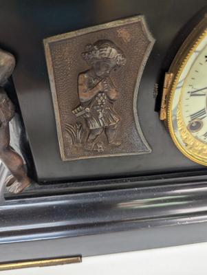 Sale Photo Thumbnail #177: Antique Cast Iron Clock Ansonia Antique Mantel Clock With Key Figural Cherub