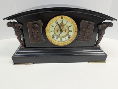 Sale Photo Thumbnail #176: Antique Cast Iron Clock Ansonia Antique Mantel Clock With Key Figural Cherub