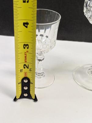 Sale Photo Thumbnail #257: 4 - 6 1/2" and 6 - 4"

The Mid 20th Century Cristal D'Arques Longehamp Wine Glasses are a set of elegant wine glasses from the Century product line. These wine glasses showcase the classic and timeless design popular in the mid-20th century, adding a touc