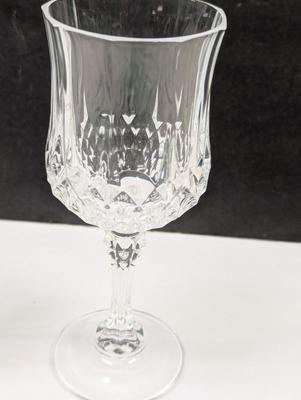 Sale Photo Thumbnail #258: 4 - 6 1/2" and 6 - 4"

The Mid 20th Century Cristal D'Arques Longehamp Wine Glasses are a set of elegant wine glasses from the Century product line. These wine glasses showcase the classic and timeless design popular in the mid-20th century, adding a touc