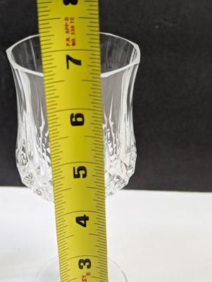 Sale Photo Thumbnail #256: 4 - 6 1/2" and 6 - 4"

The Mid 20th Century Cristal D'Arques Longehamp Wine Glasses are a set of elegant wine glasses from the Century product line. These wine glasses showcase the classic and timeless design popular in the mid-20th century, adding a touc