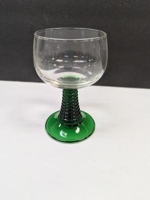 Sale Photo Thumbnail #414: The Luminarc France Dark Green Stem Beehive Wine Cordial Glasses are elegant and stylish drinkware pieces perfect for serving wine or other cordial beverages. Made in France by the reputable brand Luminarc, these cordial glasses feature a unique beehive d