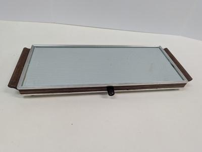 Sale Photo Thumbnail #1933: The Vintage Mid Century Salton Hotray Automatic Food Warmer is a small kitchen appliance that is perfect for keeping food warm during meals or gatherings. With its retro design and automatic food warming capabilities, this Salton brand product is both fun