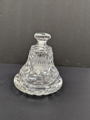 Sale Photo Thumbnail #341: The 1976 Waterford Crystal USA 200th Year Bicentennial Bell Base is a beautifully crafted piece made of crystal, designed specifically to commemorate the 200th year anniversary of the United States. This decorative bell base by Waterford is a symbol of pr
