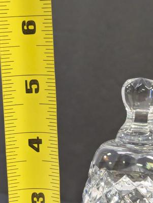 Sale Photo Thumbnail #368: The Waterford Crystal Collectors 1987 Bell is a beautifully crafted Christmas-themed bell made of crystal. This bell features a design of 4 calling birds on the 12th day of Christmas, making it a perfect addition to any collector's set. Produced in 1987 b