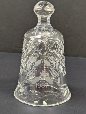 Sale Photo Thumbnail #365: The Waterford Crystal Collectors 1987 Bell is a beautifully crafted Christmas-themed bell made of crystal. This bell features a design of 4 calling birds on the 12th day of Christmas, making it a perfect addition to any collector's set. Produced in 1987 b