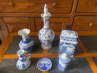 Sale Photo Thumbnail #797: Various Porcelain Pieces (Lot of 6). Includes 2 boxes with lids, candleholder, small decorative plate, and 2 vases.