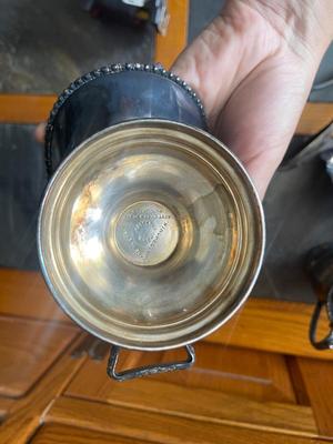 Sale Photo Thumbnail #915: Hand Engraved Silver Plate Copper Pieces Plus More (Lot of 6). Also includes a glass serving bowl and two serving spoons.