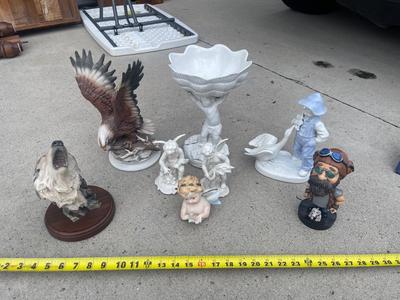Sale Photo Thumbnail #928: Anatomically Incorrect Statuettes (Lot of 8). Wall mounted wolf, several porcelain cherubs, biker bobblehead, and an eagle.