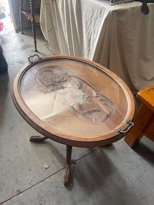 Sale Photo Thumbnail #929: Antique Glass Top Tray Carved Cherub Coffee Table. Crack in wood on tray and some damage on table legs. Carving appears to be done by hand, very intricate.