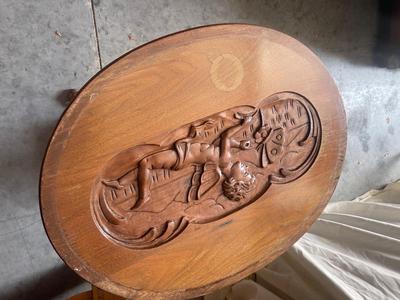 Sale Photo Thumbnail #932: Antique Glass Top Tray Carved Cherub Coffee Table. Crack in wood on tray and some damage on table legs. Carving appears to be done by hand, very intricate.