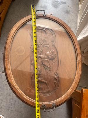 Sale Photo Thumbnail #939: Antique Glass Top Tray Carved Cherub Coffee Table. Crack in wood on tray and some damage on table legs. Carving appears to be done by hand, very intricate.