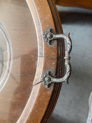 Sale Photo Thumbnail #931: Antique Glass Top Tray Carved Cherub Coffee Table. Crack in wood on tray and some damage on table legs. Carving appears to be done by hand, very intricate.