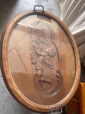 Sale Photo Thumbnail #930: Antique Glass Top Tray Carved Cherub Coffee Table. Crack in wood on tray and some damage on table legs. Carving appears to be done by hand, very intricate.