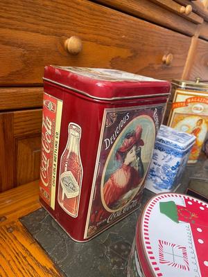 Sale Photo Thumbnail #943: Lot of Various Antique Metal Vessels (Lot of 8). One basket and several tin boxes. 2 Coca Cola boxes and one italian pasta box.