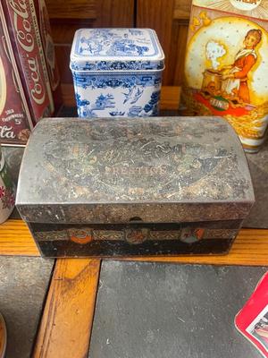 Sale Photo Thumbnail #948: Lot of Various Antique Metal Vessels (Lot of 8). One basket and several tin boxes. 2 Coca Cola boxes and one italian pasta box.