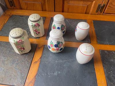 Sale Photo Thumbnail #951: Lot of Antique Salt and Pepper Shakers (Lot of 6). 3 sets, each with painted details on the sides. Removable plug in the bottom of each shaker.