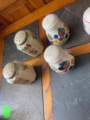 Sale Photo Thumbnail #956: Lot of Antique Salt and Pepper Shakers (Lot of 6). 3 sets, each with painted details on the sides. Removable plug in the bottom of each shaker.