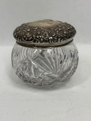 Sale Photo Thumbnail #14: Heavy, solid cut glass crystal  jar with sterling silver lid. Lid has a small dent, not very visible but can be felt, please see pictures.
Marked Sterling 925 Fine.