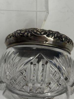 Sale Photo Thumbnail #24: Heavy, solid cut glass crystal  jar with sterling silver lid. Lid has a small dent, not very visible but can be felt, please see pictures.
Marked Sterling 925 Fine.