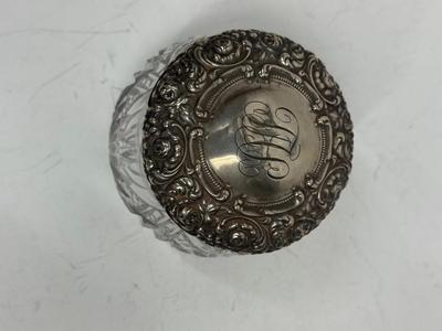 Sale Photo Thumbnail #17: Heavy, solid cut glass crystal  jar with sterling silver lid. Lid has a small dent, not very visible but can be felt, please see pictures.
Marked Sterling 925 Fine.