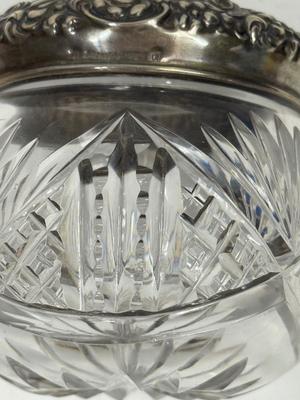 Sale Photo Thumbnail #21: Heavy, solid cut glass crystal  jar with sterling silver lid. Lid has a small dent, not very visible but can be felt, please see pictures.
Marked Sterling 925 Fine.